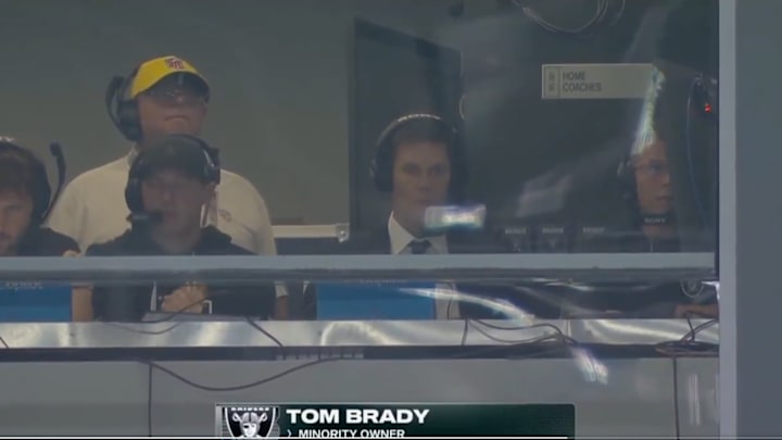 Tom Brady was seen sitting in the Raiders' coaches booth on Monday night.