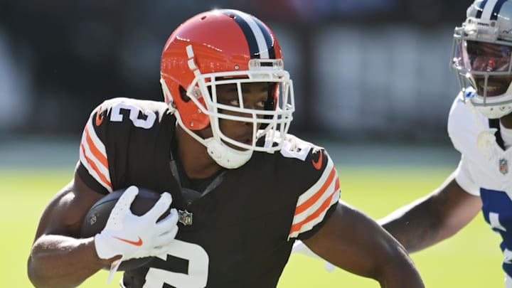 Sep 8, 2024; Cleveland, Ohio, USA; Cleveland Browns wide receiver Amari Cooper (2) runs with the ball after a catch as Dallas Cowboys cornerback Caelen Carson (21) defends during the first quarter at Huntington Bank Field. Mandatory Credit: Ken Blaze-Imagn Images