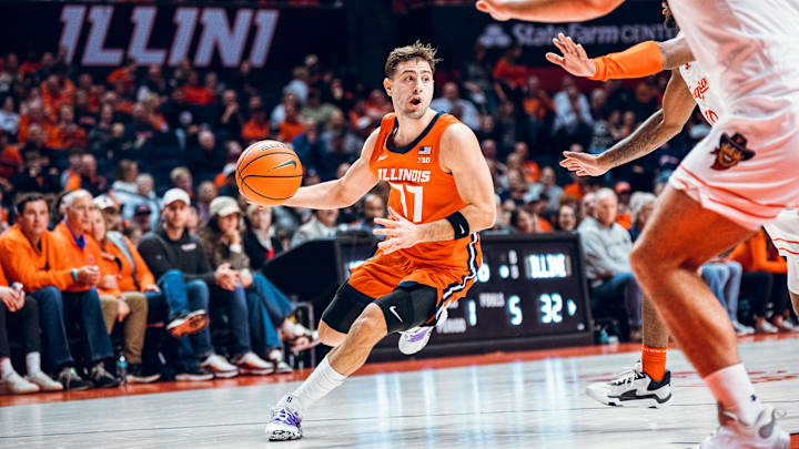 Illinois guard Mihailo Petrovic (77) looks for an open teammate in the Illini's 87-73 win over UT Rio Grande Valley on Monday at the State Farm Center in Champaign, Illinois.