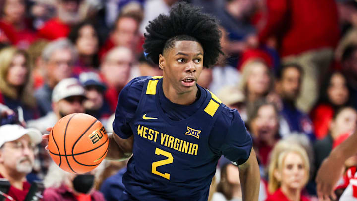 Jan 24, 2026; Tucson, Arizona, USA; West Virginia Mountaineers guard Amir Jenkins (2) dribbles the ball during the first half of the game against the Arizona Wildcats at McKale Memorial Center. Mandatory Credit: Aryanna Frank-Imagn Images