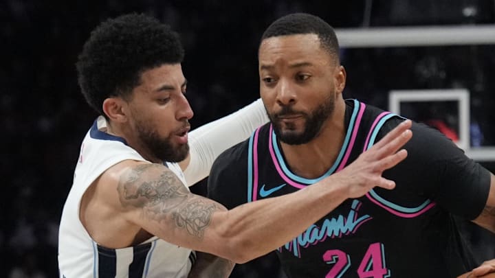 Miami Heat guard Norman Powell drives to the basket as Memphis Grizzlies guard Scotty Pippen Jr. Miami Heat guard Norman Powell drives to the basket as Memphis Grizzlies guard Scotty Pippen Jr.