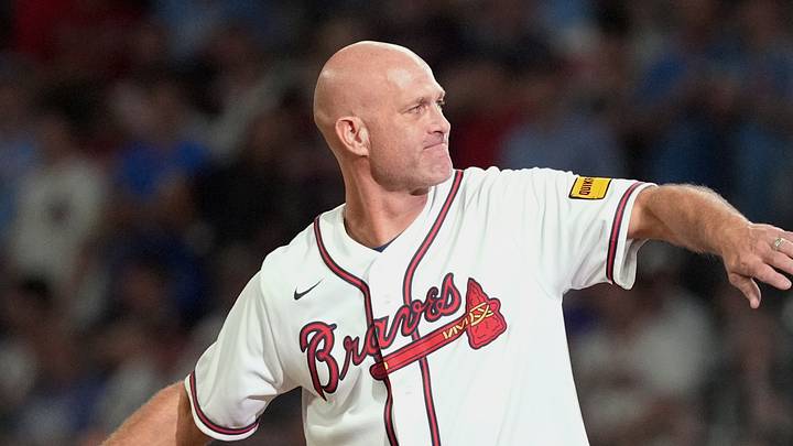 Oct 1, 2026; Cumberland, Georgia, USA;  Former Atlanta Braves pitcher Tim Hudson throws out the ceremonial first pitch before game three of the Wildcard round for the 2026 MLB Playoffs at Truist Field.  Mandatory Credit: Dale Zanine-Imagn Images