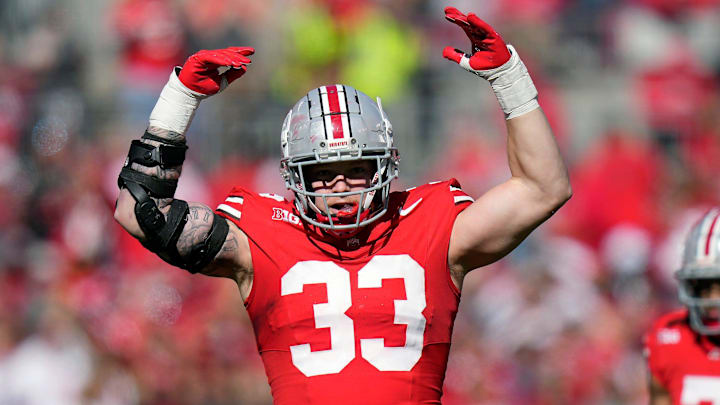 Ohio State Buckeyes defensive end Jack Sawyer (33) tries to get the crowd pumped up against Nebraska Cornhuskers during the second quarter of their game at Ohio Stadium on Oct 26, 2024, in Columbus.
