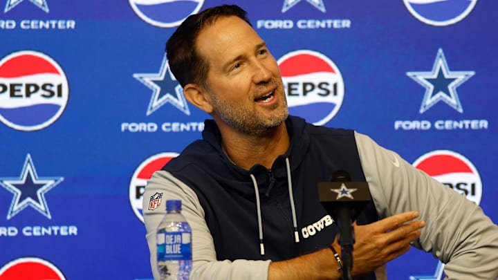 Jun 10, 2025; Arlington, TX, USA; Dallas Cowboys head coach Brian Schottenheimer addresses the media before practice at the Ford Center at the Star Training Facility in Frisco, Texas. Mandatory Credit: Chris Jones-Imagn Images Jun 10, 2025; Arlington, TX, USA; Dallas Cowboys head coach Brian Schottenheimer addresses the media before practice at the Ford Center at the Star Training Facility in Frisco, Texas. Mandatory Credit: Chris Jones-Imagn Images