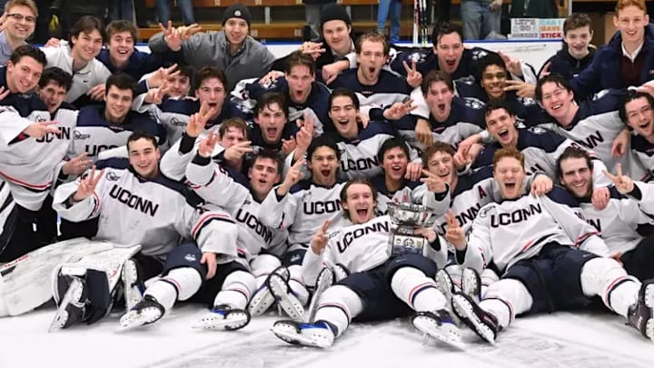 Connecticut men's hockey celebrates winning the CT Ice Championship for the second-straight year. 
