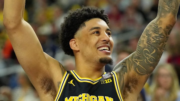 Apr 4, 2026; Indianapolis, IN, USA; Michigan Wolverines forward Yaxel Lendeborg (23) celebrates against the Arizona Wildcats in a semifinal of the Final Four of the men's 2026 NCAA Tournament at Lucas Oil Stadium. Mandatory Credit: Bob Donnan-Imagn Images Apr 4, 2026; Indianapolis, IN, USA; Michigan Wolverines forward Yaxel Lendeborg (23) celebrates against the Arizona Wildcats in a semifinal of the Final Four of the men's 2026 NCAA Tournament at Lucas Oil Stadium. Mandatory Credit: Bob Donnan-Imagn Images