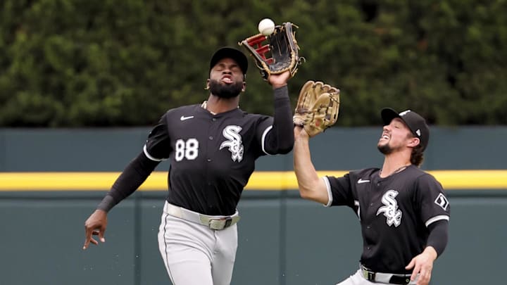 Sep 29, 2024; Detroit, Michigan, USA; Chicago White Sox center fielder Luis Robert Jr. (88) makes a catch in front of center fielder Dominic Fletcher (7) in the first inning against the Detroit Tigers at Comerica Park. Sep 29, 2024; Detroit, Michigan, USA; Chicago White Sox center fielder Luis Robert Jr. (88) makes a catch in front of center fielder Dominic Fletcher (7) in the first inning against the Detroit Tigers at Comerica Park.
