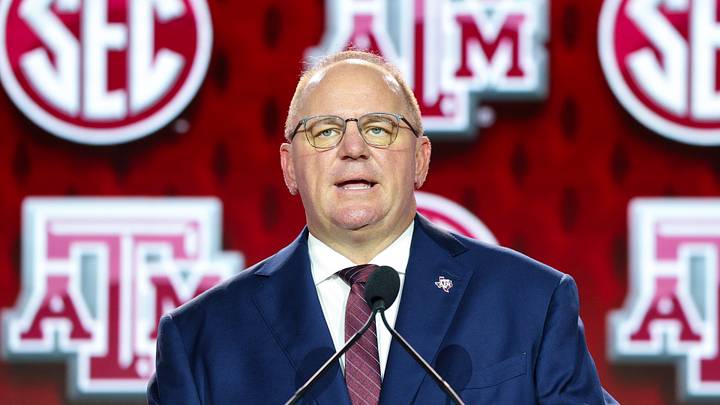 Texas A&M Aggies head coach Mike Elko speaks to the press during SEC Football Kickoff Media Day at the Tampa Marriott. Texas A&M Aggies head coach Mike Elko speaks to the press during SEC Football Kickoff Media Day at the Tampa Marriott.