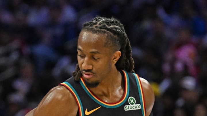 Detroit Pistons forward Tobias Harris (12) and guard Daniss Jenkins (24) celebrate against the Philadelphia 76ers during the second half at Xfinity Mobile Arena on Apr 4, 2026.