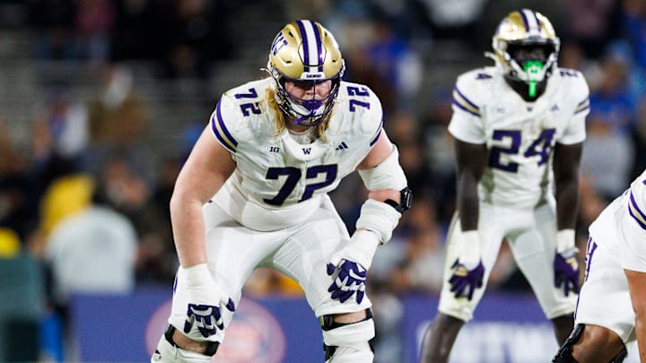 Washington true freshman offensive guard John Mills lines up at tackle during the Huskies' 48-14 Week 13 win over the UCLA Bruins. Washington true freshman offensive guard John Mills lines up at tackle during the Huskies' 48-14 Week 13 win over the UCLA Bruins.