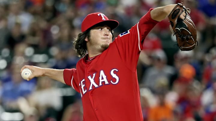 Jun 8, 2016; Arlington, TX, USA; Texas Rangers relief pitcher Luke Jackson (77) throws during the game against the Houston Astros at Globe Life Park in Arlington