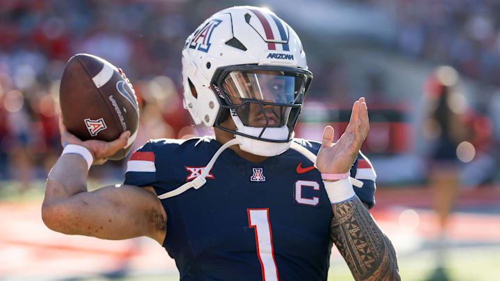 Nov 8, 2025; Tucson, Arizona, USA; Arizona Wildcats quarterback Noah Fifita (1) against the Kansas Jayhawks at Arizona Stadium. Mandatory Credit: Mark J. Rebilas-Imagn Images