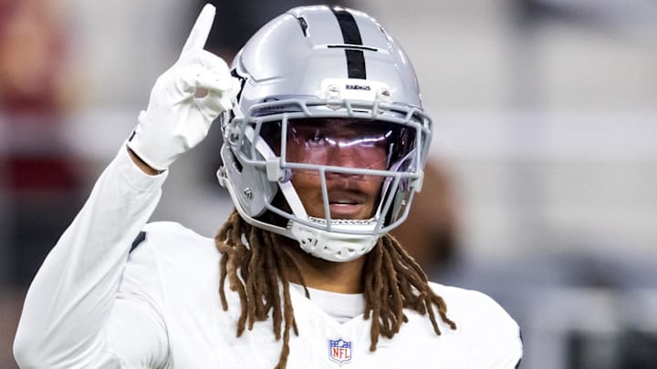 Aug 23, 2025; Glendale, Arizona, USA; Las Vegas Raiders cornerback Eric Stokes (22) against the Arizona Cardinals during a preseason NFL game at State Farm Stadium. Mandatory Credit: Mark J. Rebilas-Imagn Images
