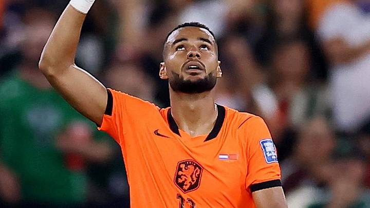 Netherlands' Cody Gakpo celebrates scoring their first goal.  