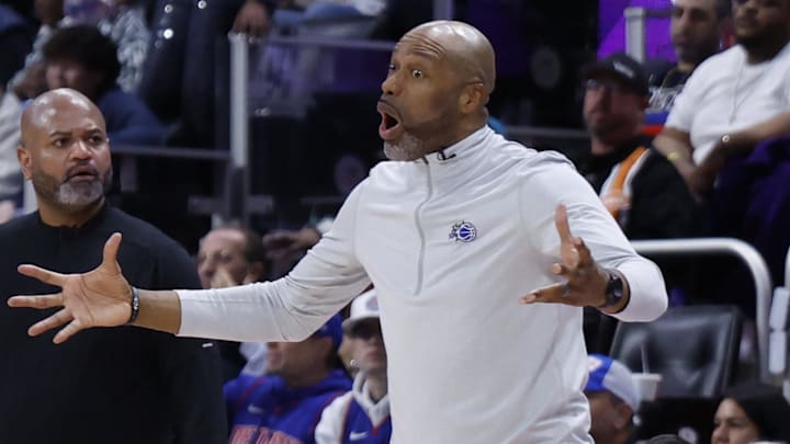 Apr 29, 2026; Detroit, Michigan, USA; Orlando Magic head coach Jamahl Mosley reacts in front of Detroit Pistons head coach J.B. Bickerstaff in the second half during game five of the first round of the 2026 NBA Playoffs at Little Caesars Arena. Mandatory Credit: Rick Osentoski-Imagn Images