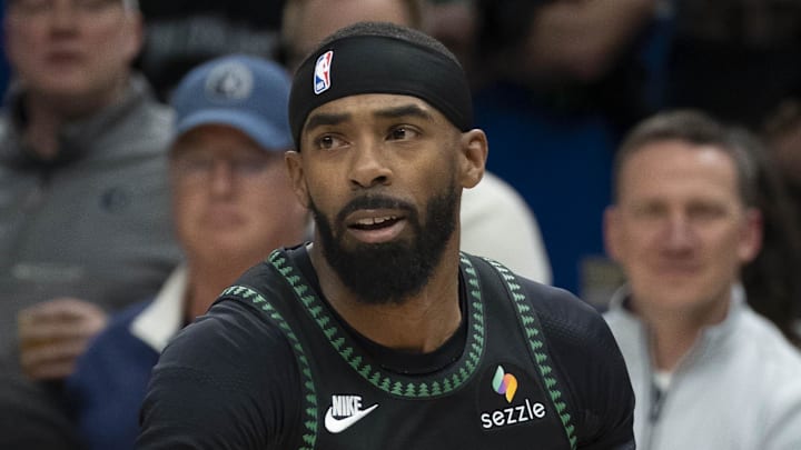 Apr 30, 2026; Minneapolis, Minnesota, USA; Minnesota Timberwolves guard Mike Conley (10) dribbles the ball against the Denver Nuggets in the first half during game six of the first round of the 2026 NBA Playoffs at Target Center. Mandatory Credit: Jesse Johnson-Imagn Images