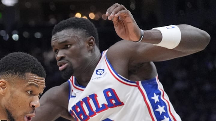 Jan 19, 2025; Milwaukee, Wisconsin, USA; Milwaukee Bucks forward Giannis Antetokounmpo (34) drives to the basket against Philadelphia 76ers center Adem Bona (30) in the first half at Fiserv Forum. Mandatory Credit: Michael McLoone-Imagn Images