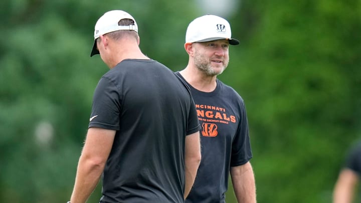 Cincinnati Bengals head coach Zac Taylor and director of player personnel Duke Tobin talk during practice at the Paycor Stadium practice field in downtown Cincinnati on Wednesday, Aug. 20, 2025.