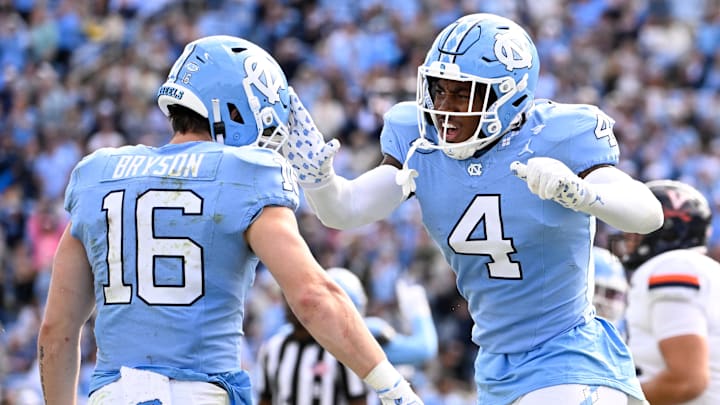 Oct 25, 2025; Chapel Hill, North Carolina, USA; North Carolina Tar Heels defensive back Coleman Bryson (16) and linebacker Mikai Gbayor (4) react in the fourth quarter at Kenan Stadium. Mandatory Credit: Bob Donnan-Imagn Images