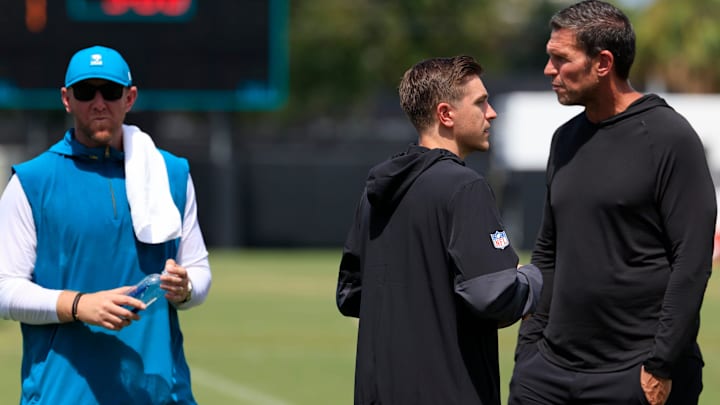 From left, Jacksonville Jaguars head coach Liam Coen, general manager James Gladstone and Tony Boselli, executive vice president of football operations, talk after an NFL training camp session at the Miller Electric Center, Thursday, Aug. 14, 2025 in Jacksonville, Fla. From left, Jacksonville Jaguars head coach Liam Coen, general manager James Gladstone and Tony Boselli, executive vice president of football operations, talk after an NFL training camp session at the Miller Electric Center, Thursday, Aug. 14, 2025 in Jacksonville, Fla.