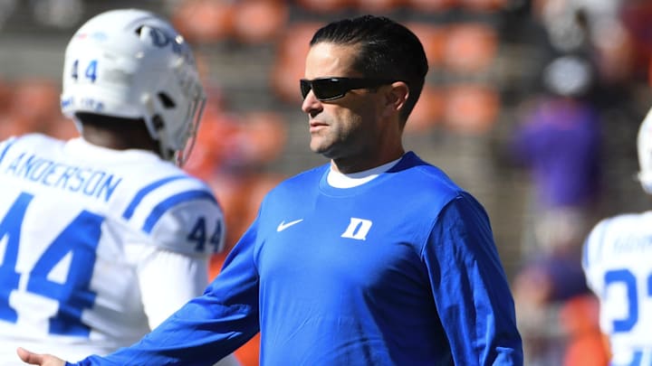 Duke Blue Devils head coach Manny Diaz high-fives players Saturday, Nov. 1, 2025, during the NCAA football game against the Clemson Tigers at Memorial Stadium in Clemson, South Carolina.