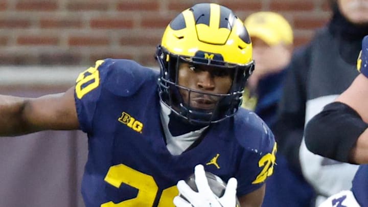 Nov 23, 2024; Ann Arbor, Michigan, USA;  Michigan Wolverines running back Kalel Mullings (20) rushes in the first half against the Northwestern Wildcats at Michigan Stadium. Mandatory Credit: Rick Osentoski-Imagn Images