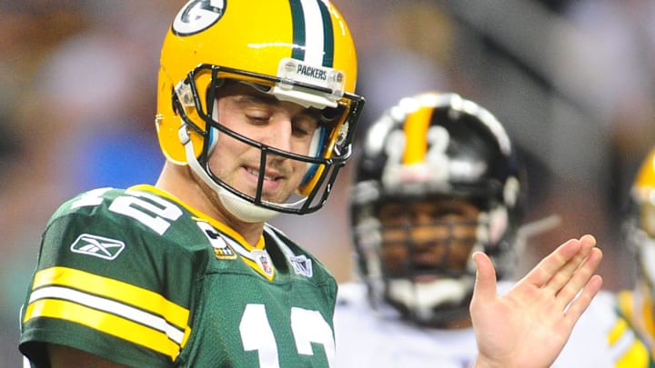 Green Bay Packers quarterback Aaron Rodgers reacts during the first half of Super Bowl XLV against the Pittsburgh Steelers. Green Bay Packers quarterback Aaron Rodgers reacts during the first half of Super Bowl XLV against the Pittsburgh Steelers.