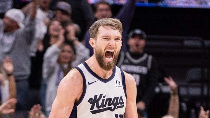 Jan 6, 2025; Sacramento, California, USA; Sacramento Kings forward Domantas Sabonis (11) reacts after making a three point shot against the Miami Heat during overtime at Golden 1 Center. Mandatory Credit: Ed Szczepanski-Imagn Images