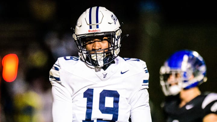 Farmington's Myles Smith celebrates a defensive stop during the Division 2 football district semifinal on Friday, Nov. 1, 2024.