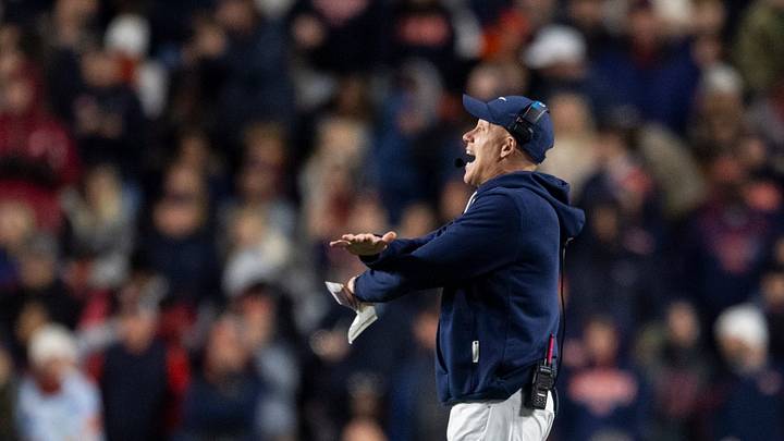Auburn Tigers interim head coach DJ Durkin talks with his team as Auburn Tigers take on Alabama Crimson Tide in the Iron Bowl at Jordan-Hare Stadium in Auburn, Ala. on Saturday, Nov. 29, 2025. Alabama Crimson Tide defeated Auburn Tigers 27-20.