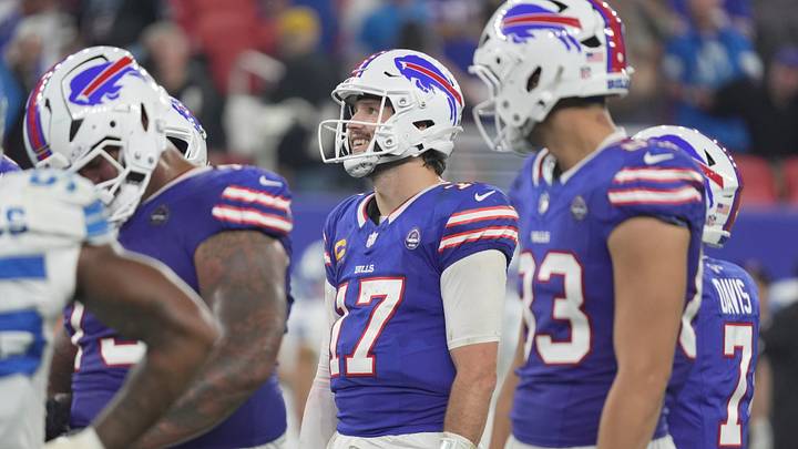 Buffalo Bills quarterback Josh Allen winds down the clock and smiles as the fourth quarter concludes with the Bills winning 41-31 in their home opener against the Detroit Lions on Sept. 17, 2026.