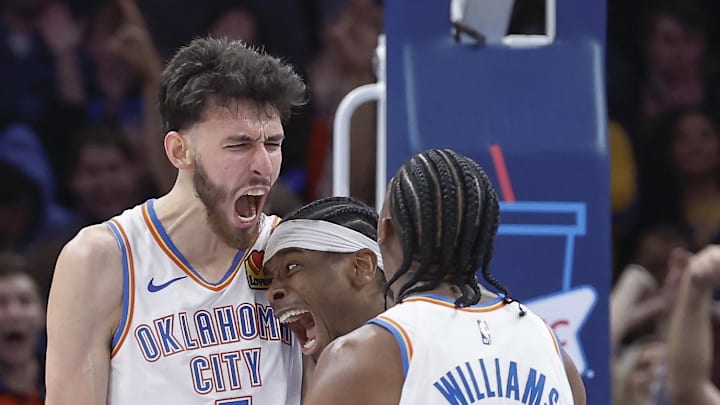 Dec 8, 2023; Oklahoma City, Oklahoma, USA; Oklahoma City Thunder forward Chet Holmgren (7), and guard Shai Gilgeous-Alexander (2) celebrate after Chet Holmgren scores a basket against the Golden State Warriors during the second half at Paycom Center. Mandatory Credit: Alonzo Adams-Imagn Images