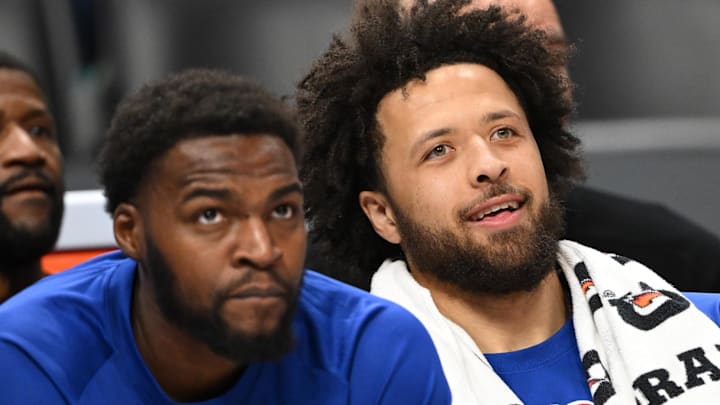 Detroit Pistons guard Cade Cunningham center watches from the bench. Detroit Pistons guard Cade Cunningham center watches from the bench.