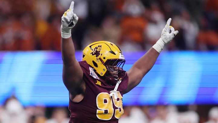 Jan 1, 2025; Atlanta, GA, USA; Arizona State Sun Devils defensive lineman C.J. Fite (99) reacts after a play against the Texas Longhorns during the second half of the Peach Bowl at Mercedes-Benz Stadium. Mandatory Credit: Brett Davis-Imagn Images