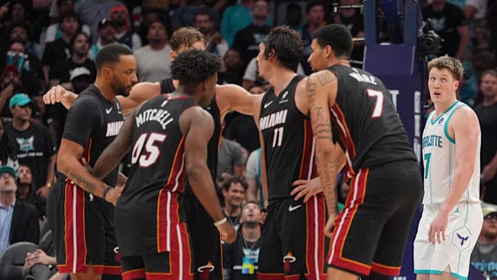 Apr 14, 2026; Charlotte, North Carolina, USA; Both teams look on after a time out during the second half during the play-in rounds between the Charlotte Hornets and the Miami Heat of the 2026 NBA Playoffs at Spectrum Center. Mandatory Credit: Jim Dedmon-Imagn Images