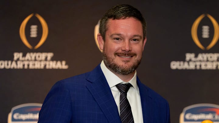 Oregon head coach Dan Lanning holds an orange during the head coaches press conference ahead of Orange Bowl on Dec. 31, 2025, in Dania Beach, Florida.