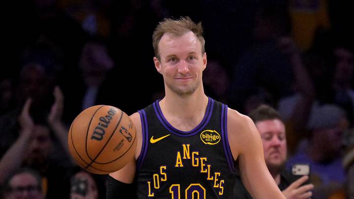 Los Angeles Lakers guard Luke Kennard smiles on the court during the final seonds of Game 2 of the first round of the 2026 NBA Playoffs at against the Houston Rockets at Crypto.com Arena.