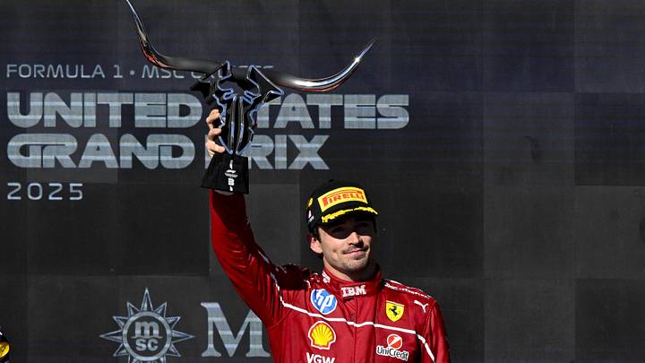 Oct 19, 2025: Scuderia Ferrari driver Charles Leclerc (16) of Team Monaco raises his trophy after he places in third place in the 2025 US Grand Prix at Circuit of The Americas in Austin, Texas.