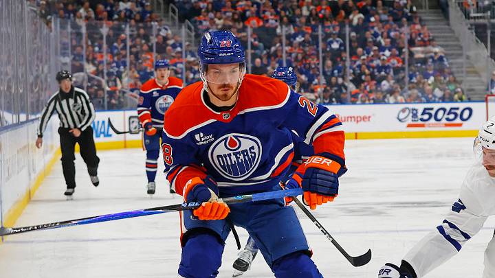 Feb 3, 2026; Edmonton, Alberta, CAN; Toronto Maple Leafs defensemen Simon Benoit (2) knocks the puck away from Edmonton Oilers forward Jack Roslovic (28) during the third period at Rogers Place. Mandatory Credit: Perry Nelson-Imagn Images Feb 3, 2026; Edmonton, Alberta, CAN; Toronto Maple Leafs defensemen Simon Benoit (2) knocks the puck away from Edmonton Oilers forward Jack Roslovic (28) during the third period at Rogers Place. Mandatory Credit: Perry Nelson-Imagn Images
