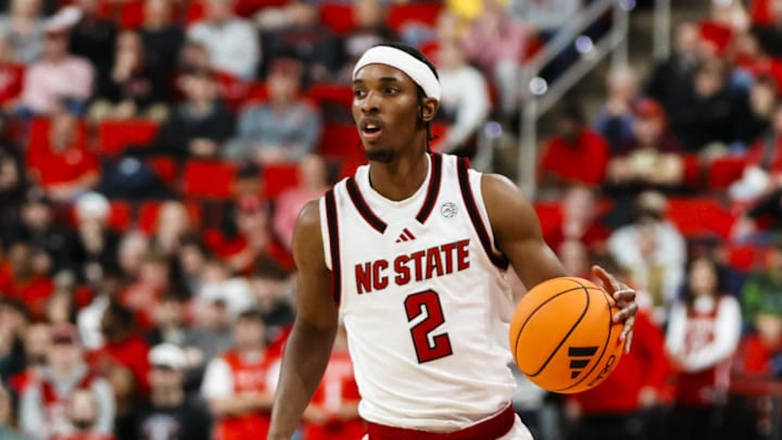 Jan 27, 2026; Raleigh, North Carolina, USA; NC State Wolfpack guard Jr. Paul McNeil (2) dribbles the ball during the first half of the game against the Syracuse Orange at Lenovo Center. Mandatory Credit: Jaylynn Nash-Imagn Images