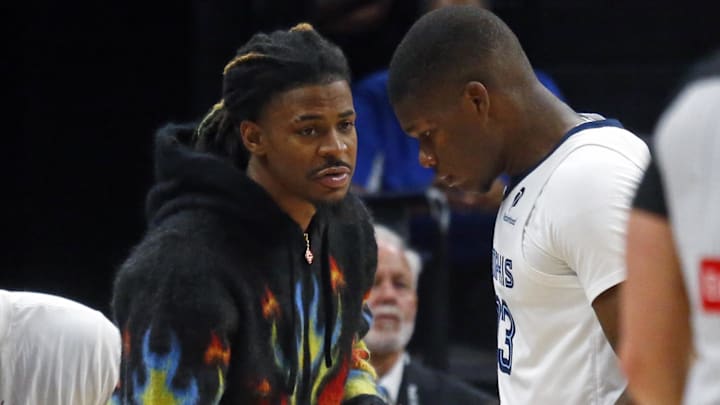Oct 6, 2025; Memphis, Tennessee, USA; Memphis Grizzlies guard Ja Morant (12) talks with Memphis Grizzlies forward Cedric Coward (23)  at FedExForum. Mandatory Credit: Petre Thomas-Imagn Images