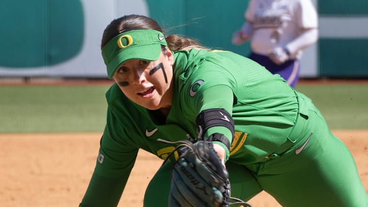 Oregon’s Katie Flannery makes a diving catch of a bunt against Washington at Jane Sanders Stadium in Eugene April 18, 2026.
