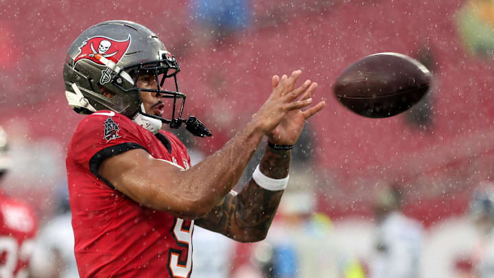 Tampa Bay Buccaneers wide receiver Emeka Egbuka (9) works out prior to the game against the Tennessee Titans. Tampa Bay Buccaneers wide receiver Emeka Egbuka (9) works out prior to the game against the Tennessee Titans.