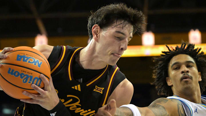Dec 17, 2025; Los Angeles, California, USA; Arizona State Sun Devils forward Andrija Grbovic (14) beats UCLA Bruins guard Skyy Clark (55) to a rebound in the first half at Pauley Pavilion presented by Wescom Financial. Mandatory Credit: Jayne Kamin-Oncea-Imagn Images Dec 17, 2025; Los Angeles, California, USA; Arizona State Sun Devils forward Andrija Grbovic (14) beats UCLA Bruins guard Skyy Clark (55) to a rebound in the first half at Pauley Pavilion presented by Wescom Financial. Mandatory Credit: Jayne Kamin-Oncea-Imagn Images