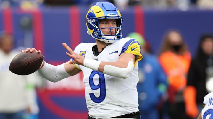 Dec 31, 2023; East Rutherford, New Jersey, USA; Los Angeles Rams quarterback Matthew Stafford (9) throws the ball during the first half against the New York Giants at MetLife Stadium. Mandatory Credit: Vincent Carchietta-Imagn Images
