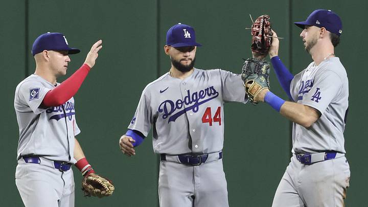 Los Angeles Dodgers celebrate in the outfield after defeating the Pittsburgh Pirates