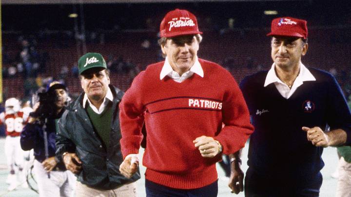 Sep 21, 1987; E. Rutherford, NJ, USA; New England Patriots head coach Raymond Berry leaves the field ahead of New York Jets head coach Joe Walton at Giants Stadium. Mandatory Credit: Imagn Images Sep 21, 1987; E. Rutherford, NJ, USA; New England Patriots head coach Raymond Berry leaves the field ahead of New York Jets head coach Joe Walton at Giants Stadium. Mandatory Credit: Imagn Images