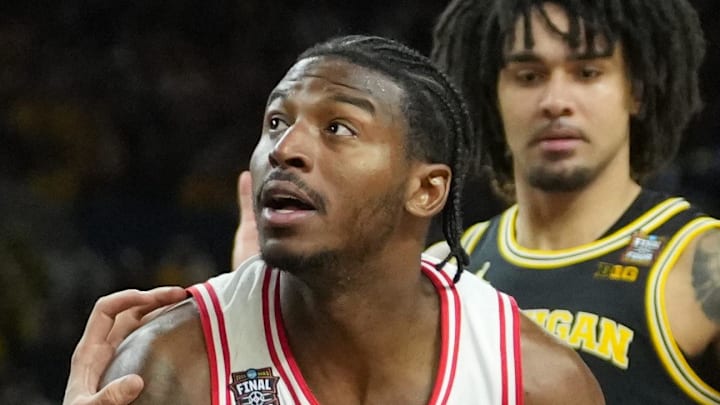 Apr 4, 2026; Indianapolis, IN, USA; Arizona Wildcats guard Jaden Bradley (0) drives against Michigan Wolverines center Aday Mara (15) in the second half during a semifinal of the Final Four of the men's 2026 NCAA Tournament at Lucas Oil Stadium. Mandatory Credit: Robert Deutsch-Imagn Images Apr 4, 2026; Indianapolis, IN, USA; Arizona Wildcats guard Jaden Bradley (0) drives against Michigan Wolverines center Aday Mara (15) in the second half during a semifinal of the Final Four of the men's 2026 NCAA Tournament at Lucas Oil Stadium. Mandatory Credit: Robert Deutsch-Imagn Images