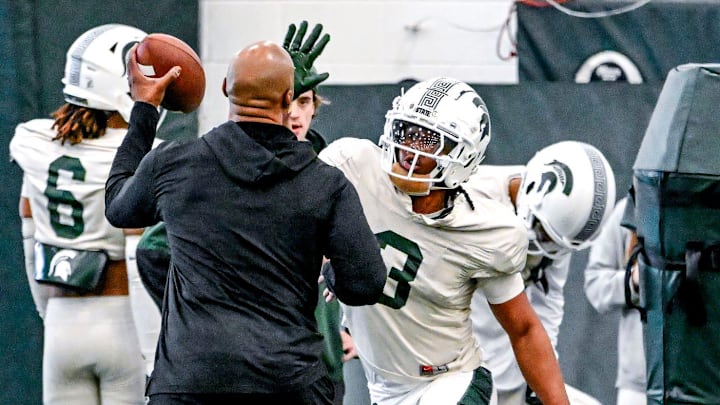 Michigan State defensive back Jeremiah Hughes, center, runs a drill during football practice on Tuesday, April 8, 2025, in East Lansing. Michigan State defensive back Jeremiah Hughes, center, runs a drill during football practice on Tuesday, April 8, 2025, in East Lansing.