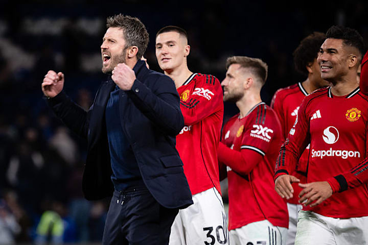 Michael Carrick celebrating with his players.